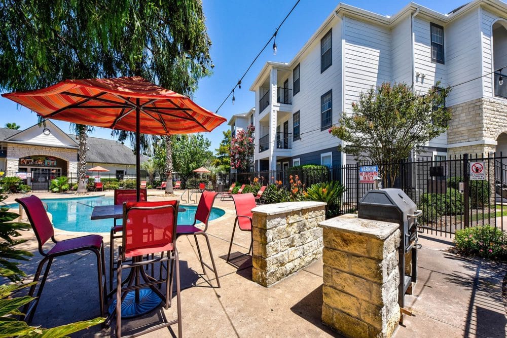 crossing place college station off campus apartments near texas a m poolside grilling stations patio seating